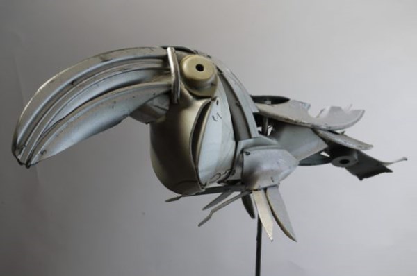 10 Amazing Sculptures Made of Hubcaps - amazing sculptures, hubcaps - Oddee